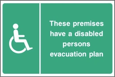 These premises have a disabled persons evacuation plan sign showing wheelchair symbol and evacuation-plan message. Artwork EMER0094.