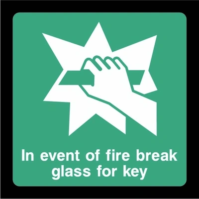 Green and white In event of fire break glass for key sign showing hand breaking glass pictogram. Artwork EMER0063.