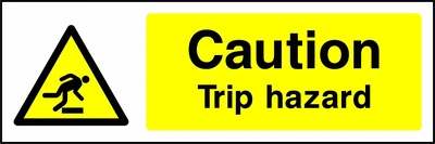Caution — Trip hazard sign showing yellow trip hazard warning pictogram beside wording. Artwork GENE0018.