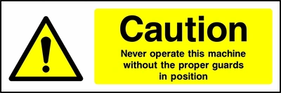 Caution — Never operate this machine without the proper guards in position sign showing yellow exclamation warning triangle beside wording. Artwork MACH0014.