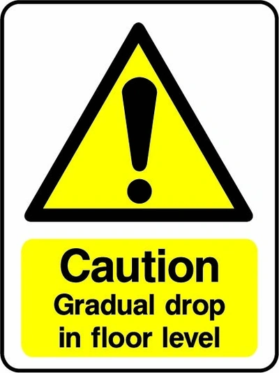 Caution — Gradual drop in floor level sign showing yellow warning triangle above wording. Artwork DDA0002.