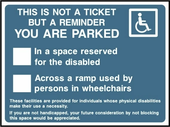 This Is Not A Ticket But A Reminder — You Are Parked — In a space reserved for the disabled or across a ramp used by persons in wheelchairs sign. blue-grey accessibility parking reminder with