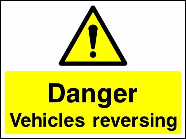 A black exclamation mark inside a yellow warning triangle above black wording on a yellow panel with Danger — Vehicles reversing wording. CONS0097 artwork.